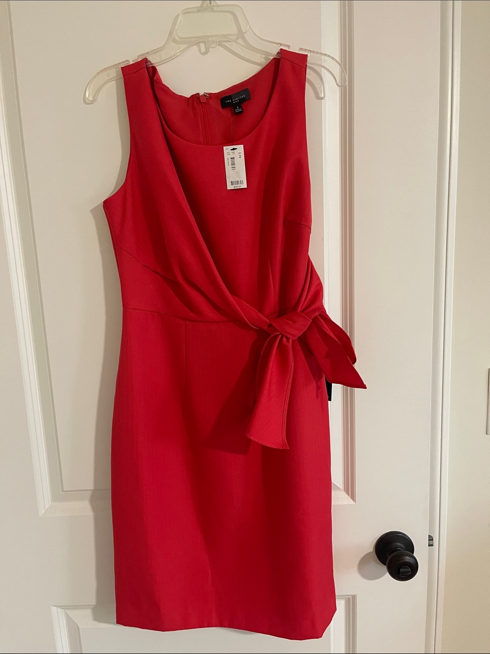 The limited Red Sleeveless Tie-Front Sheath Dress. New with tags!